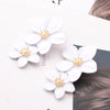 boucle d oreille fleur blanche